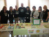 Literature table.  Pictured left to right:  Nancy Sands, Dawne Eng, Cynthia King, Michael Harren, Rina Deych, Louise Silnick, Bree Sands, and Nicole Sands.